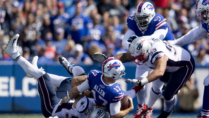 New England Patriots linebacker John Simon and Buffalo Bills quarterback Josh Allen