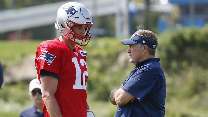 Former New England Patriots quarterback Tom Brady and head coach Bill Belichick