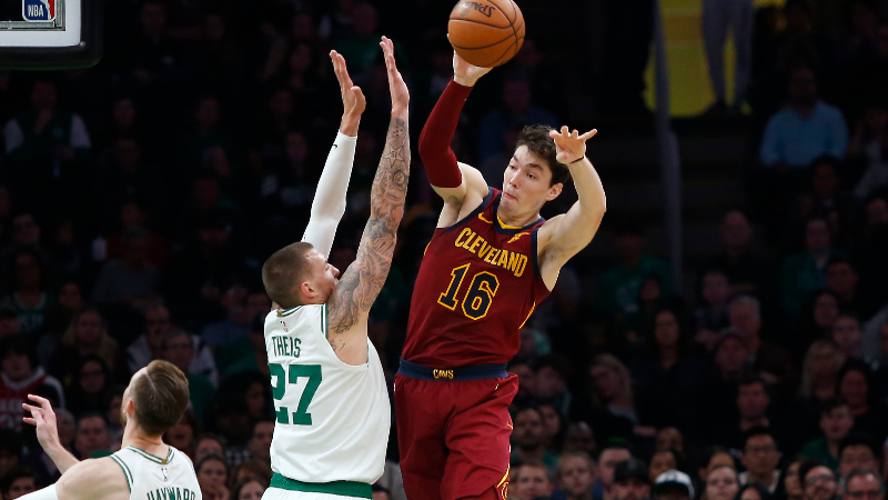 Cleveland Cavaliers forward Cedi Osman (16) and Boston Celtics forward Daniel Theis (27)