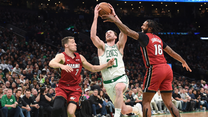 Boston Celtics forward Gordon Hayward (20), Miami Heat guard Goran Dragic (7) and center James Johnson (16)