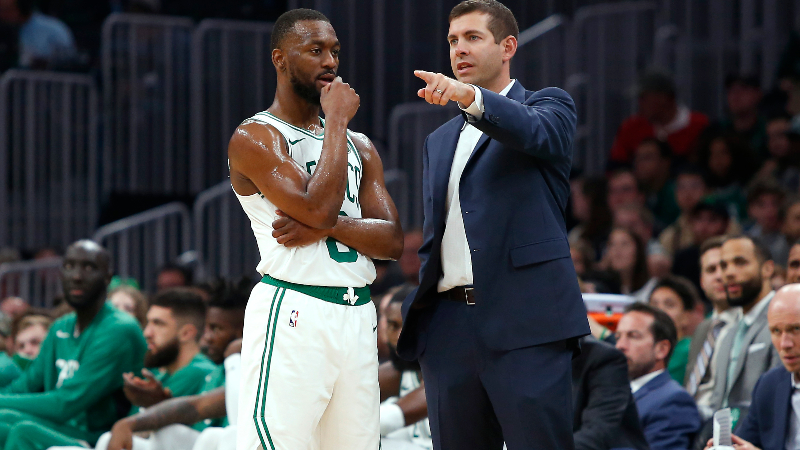 Boston Celtics head coach Brad Stevens and guard Kemba Walker (8)