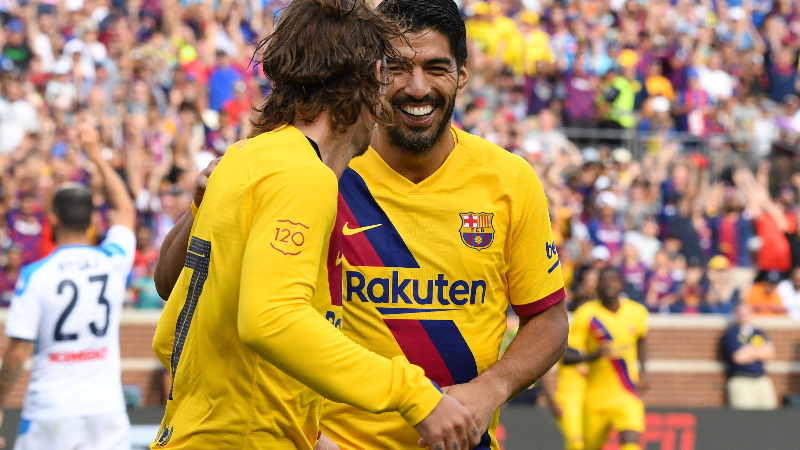 Barcelona forwards Luis Suarez (9) and Antoine Griezmann (7)