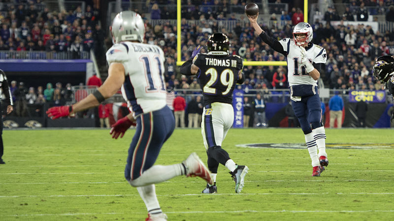 New England Patriots safety Julian Edelman, Baltimore Ravens safety Earl Thomas and Patriots quarterback Tom Brady