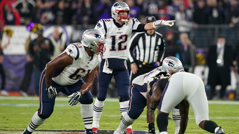 New England Patriots right tackle Marcus Cannon and quarterback Tom Brady