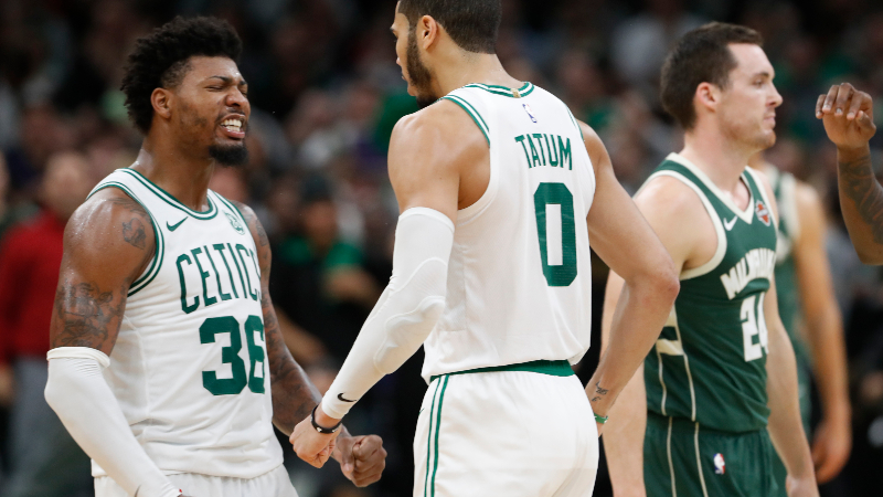 Boston Celtics guard Marcus Smart (36) and forward Jayson Tatum (0)