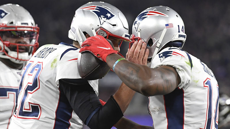 New England Patriots quarterback Tom Brady and quarterback Mohamed Sanu