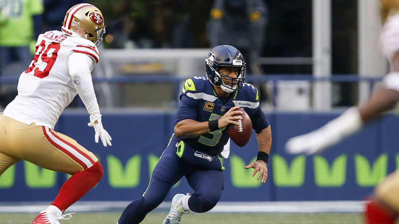 San Francisco 49ers defensive lineman DeForest Buckner and Seattle Seahawks quarterback Russell Wilson