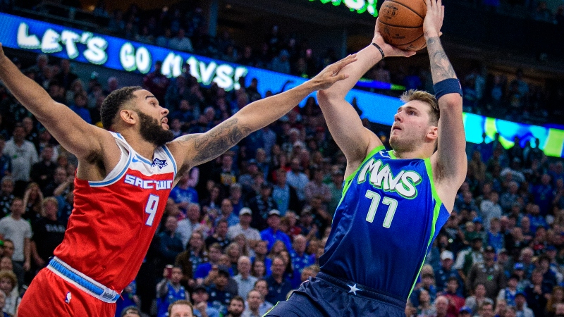 Dallas Mavericks forward Luka Doncic (77) and Sacramento Kings guard Cory Joseph (9)