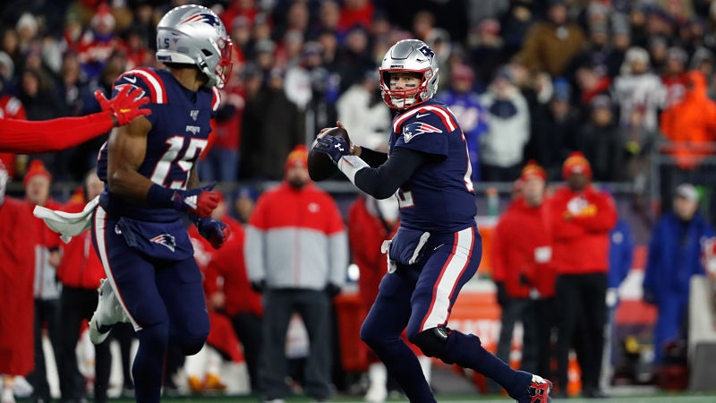 New England Patriots wide receiver N'Keal Harry and quarterback Tom Brady