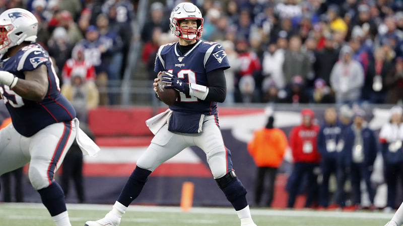 New England Patriots right guard Shaq Mason and quarterback Tom Brady