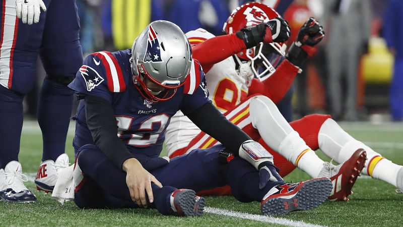 New England Patriots quarterback Tom Brady and Kansas City Chiefs defensive lineman Tanoh Kpassagnon