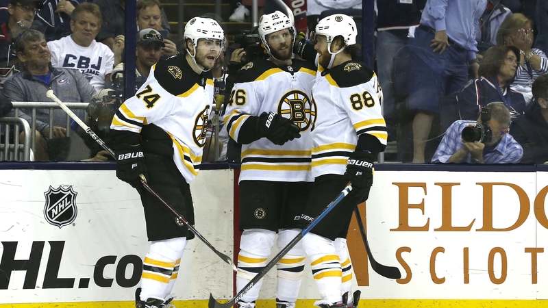Boston Bruins' Jake DeBrusk, David Krejci And David Pastrnak