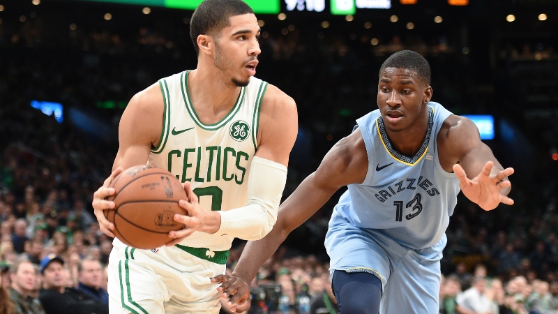 Boston Celtics forward Jayson Tatum (0) and Memphis Grizzlies forward Jaren Jackson Jr. (13)