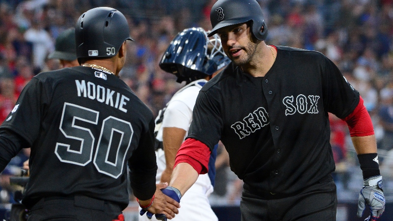 Boston Red Sox designated hitter J.D. Martinez (right) and right fielder Mookie Betts