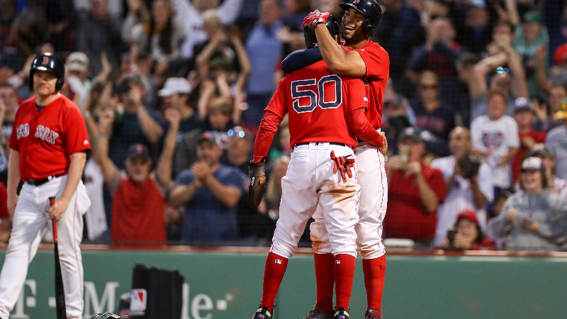 Boston Red Sox right fielder Mookie Betts (50) and shortstop Xander Bogaerts (2)