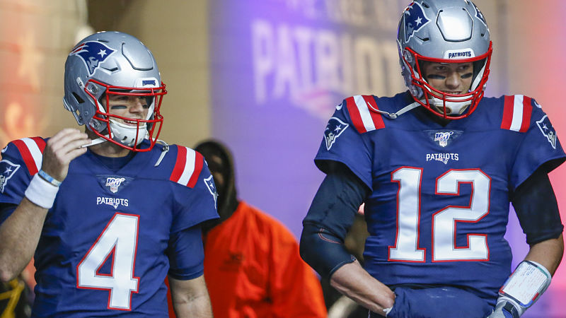 New England Patriots quarterbacks Jarrett Stidham and Tom Brady