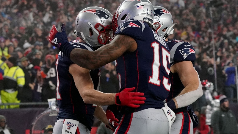New England Patriots wide receiver Julian Edelman (11), wide receiver N'Keal Harry (15) and running back Rex Burkhead (34)
