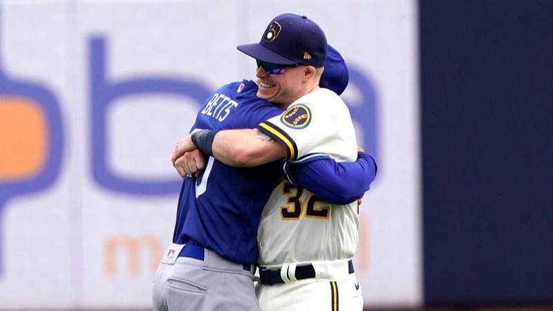 Los Angeles Dodgers outfielder Mookie Betts and Milwaukee Brewers utilityman Brock Holt