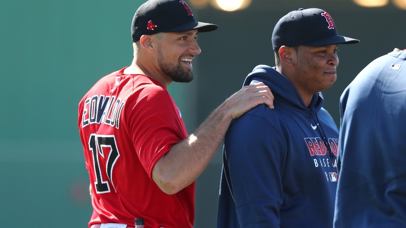 Boston Red Sox starting pitcher Nathan Eovaldi (17) and third baseman Rafael Devers (right)