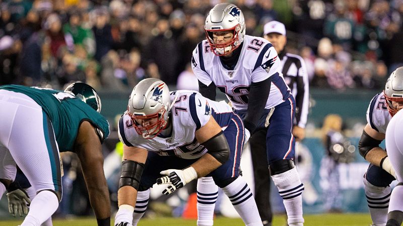 New England Patriots center Ted Karras and quarterback Tom Brady