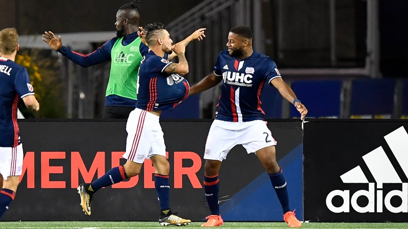 New England Revolution midfielder Diego Fagundez (left) and defender Andrew Farrell