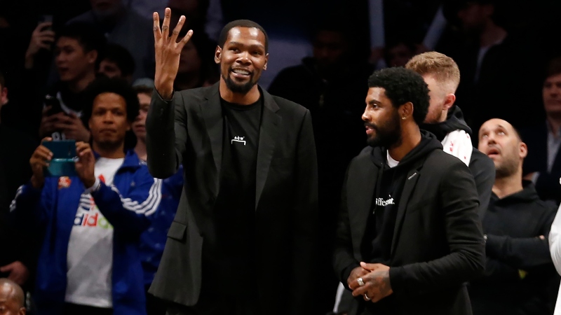 Brooklyn Nets forward Kevin Durant and guard Kyrie Irving (right)