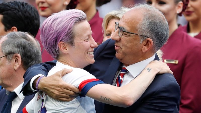 USWNT forward Megan Rapinoe, US Soccer President Carlos Cordeiro