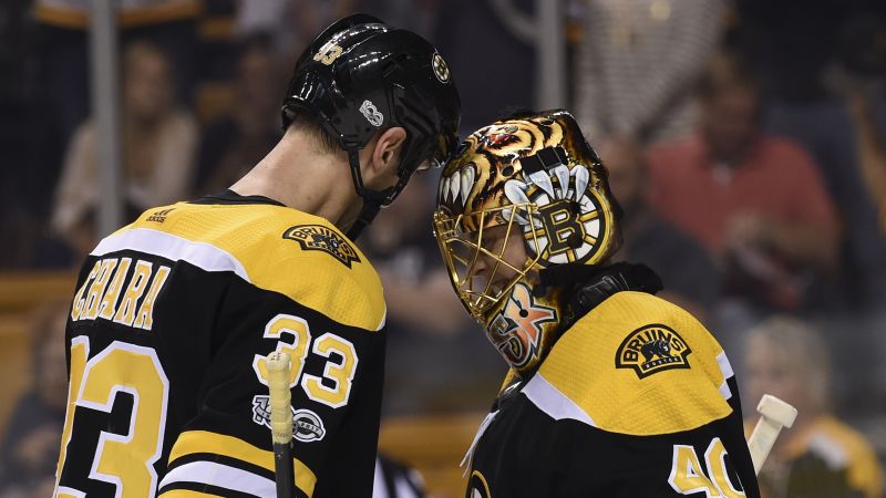 Boston Bruins' Zdeno Chara and Tuukka Rask