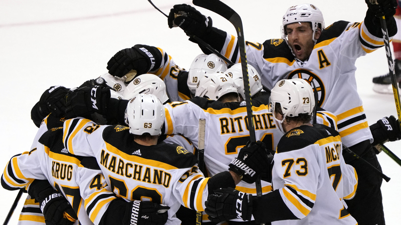 Boston Bruins' Torey Krug, Brad Marchand, Nick Ritchie