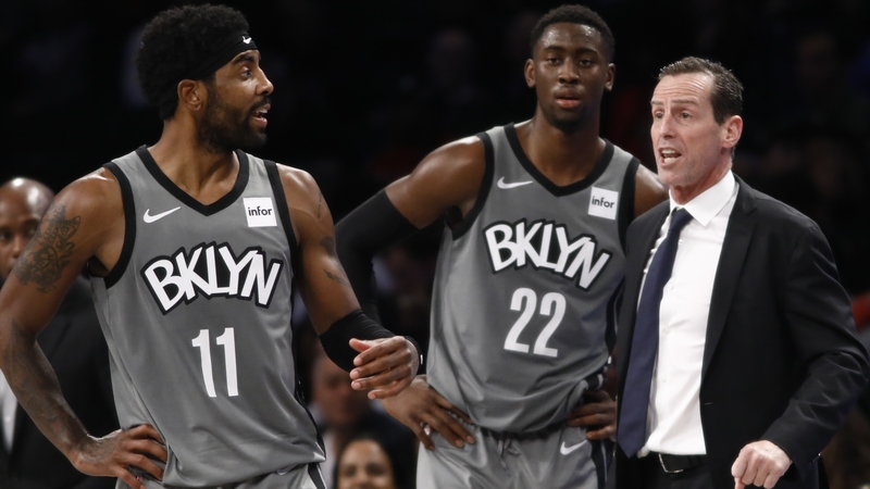 Brooklyn Nets guards Kyrie Irving, Caris LeVert; former Nets head coach Kenny Atkinson
