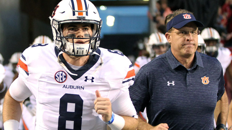 Patriots quarterback Jarrett Stidham, Auburn head coach Gus Malzahn