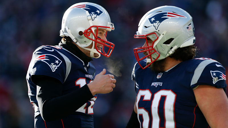 Tampa Bay Buccaneers quarterback Tom Brady and New England Patriots center David Andrews