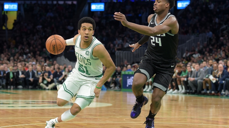 Boston Celtics point guard Tremont Waters (left) and Sacramento Kings guard Buddy Hield