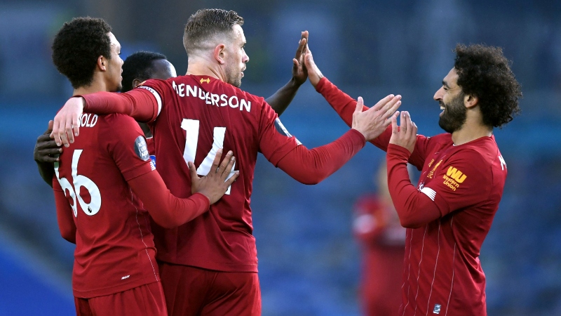 Liverpool's Mohamed Salah (right), Jordan Henderson (middle) and Trent Alexander-Arnold