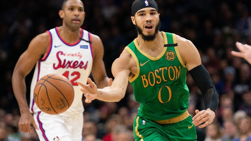 Boston Celtics forward Jayson Tatum (right) and Philadelphia 76ers center Al Horford