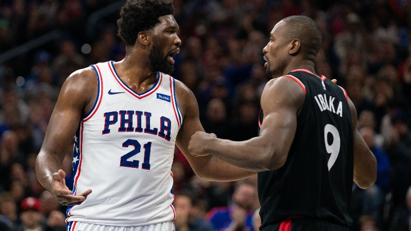 Philadelphia 76ers center Joel Embiid (21) and Toronto Raptors forward Serge Ibaka (9)