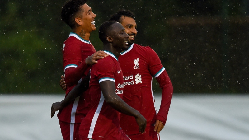 Liverpool forwards Roberto Firmino (left), Sadio Mane (center) and Mohamed Salah