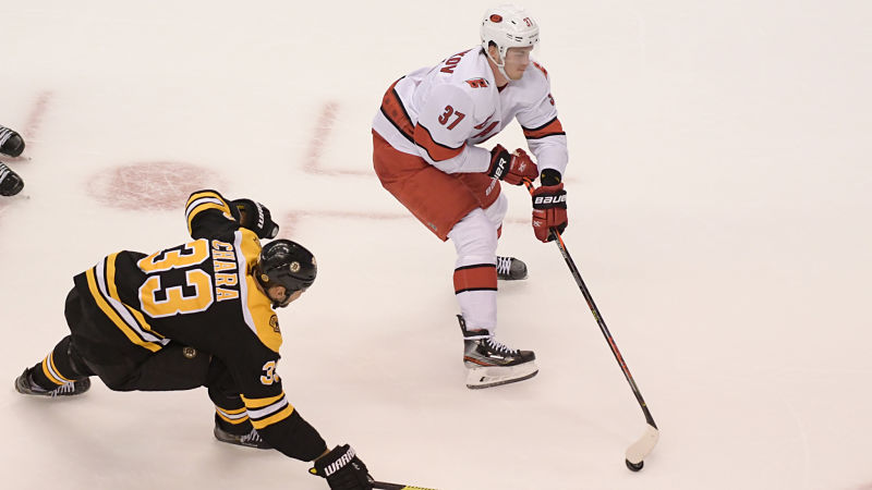 Boston Bruins defenseman Zdeno Chara and Carolina Hurricanes right wing Andrei Svechnikov