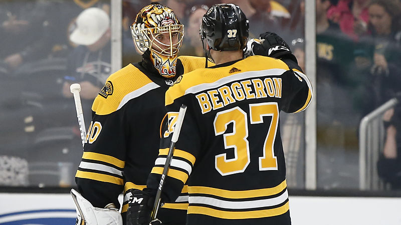 Boston Bruins players Tuukka Rask and Patrice Bergeron