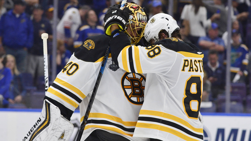 Boston Bruins' Tuukka Rask and David Pastrnak