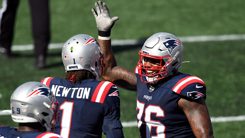 New England Patriots quarterback Cam Newton and left tackle Isaiah Wynn