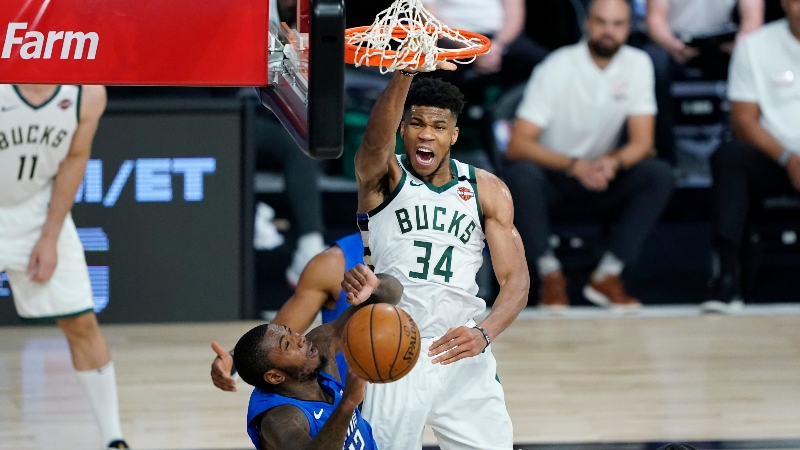 Milwaukee Bucks forward Giannis Antetokounmpo (34) and Orlando Magic forward Gary Clark