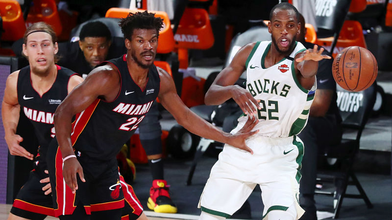 Miami Heat forward Jimmy Butler and Milwaukee Bucks forward Khris Middleton