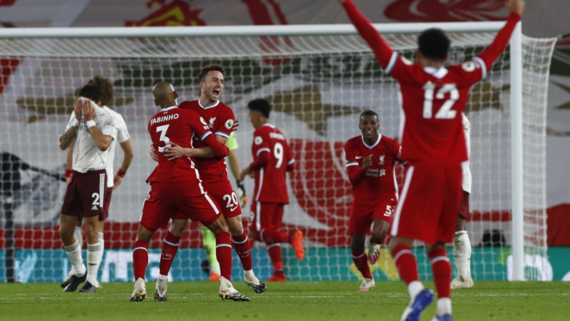 Liverpool midfielder Fabinho (3) and Diogo Jota (20)