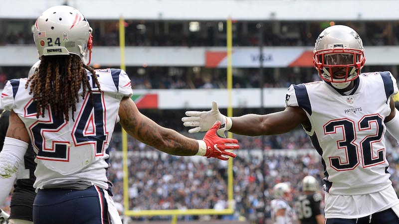 Patriots defensive backs Stephon Gilmore, Devin McCourty