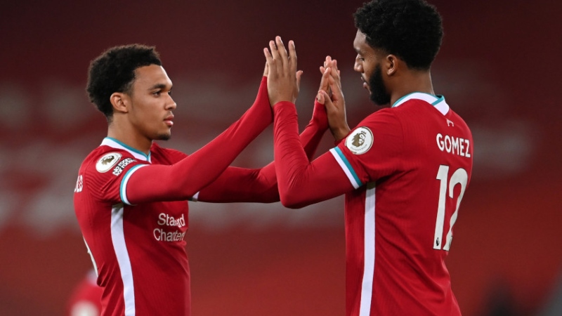 Liverpool defenders Trent Alexander-Arnold (left) and Joe Gomez
