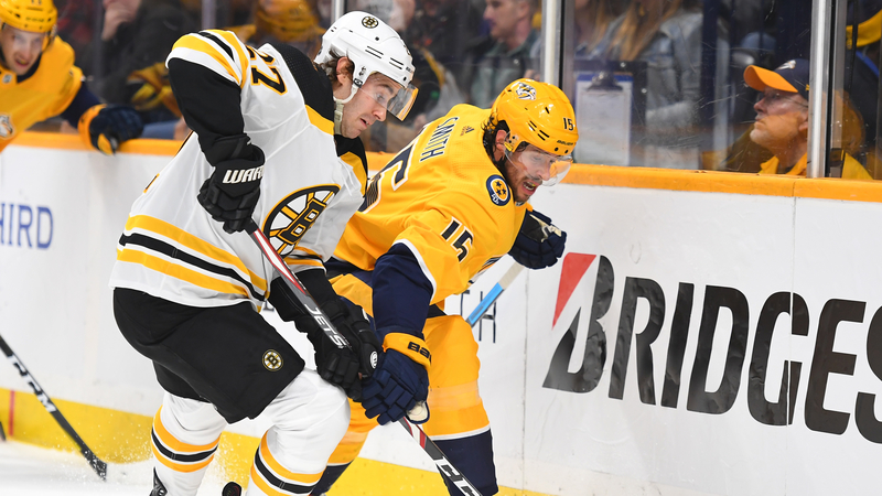 Boston Bruins defenseman John Moore, Nashville Predators forward Craig Smith