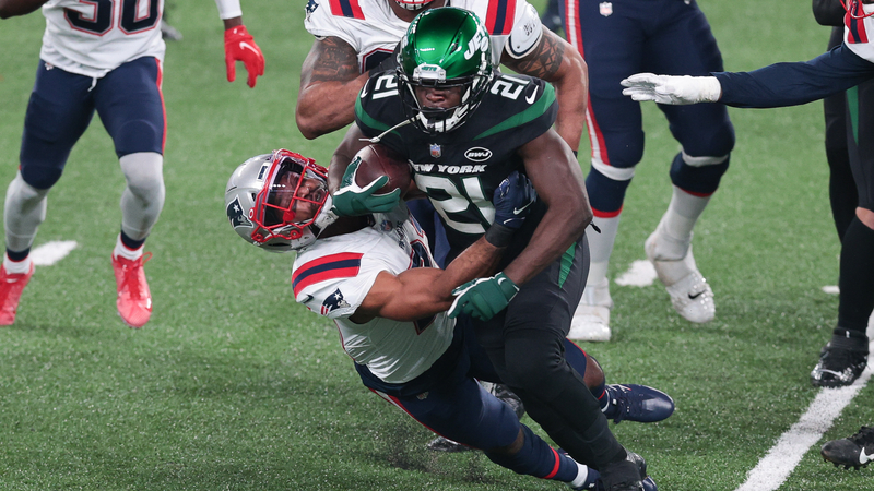 New York Jets' Frank Gore, New England Patriots' Adrian Phillips