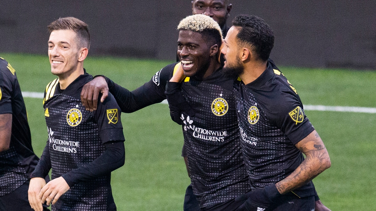 Columbus Crew SC forward Gyasi Zardes (center) and teammates