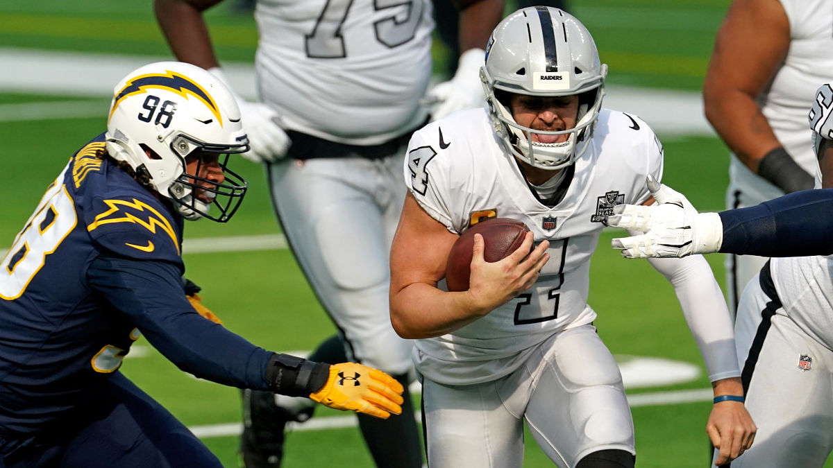 Los Angeles Chargers defensive end Isaac Rochell and Las Vegas Raiders quarterback Derek Carr